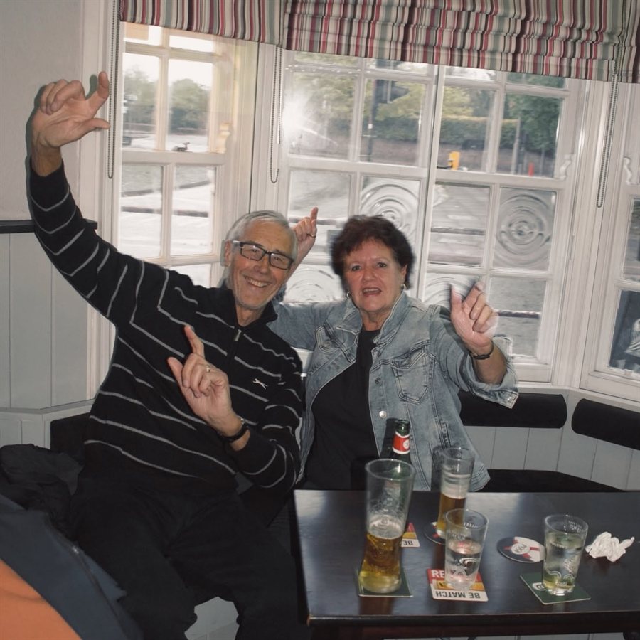 Regulars dancing by the window